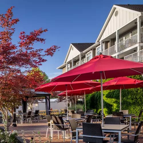 inviting patio with furniture at chartwell chatsworth retirement residence