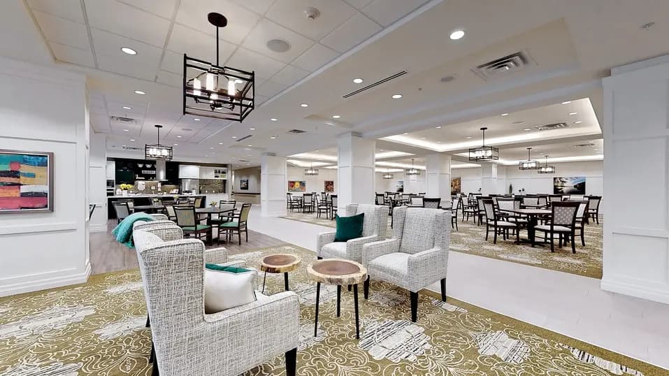 Common space area with table and chairs at Chartwell Fraser Terrace