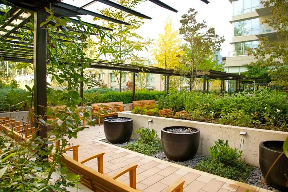 Alternative view of exterior garden and sitting area at Chartwell Wesbrook Village