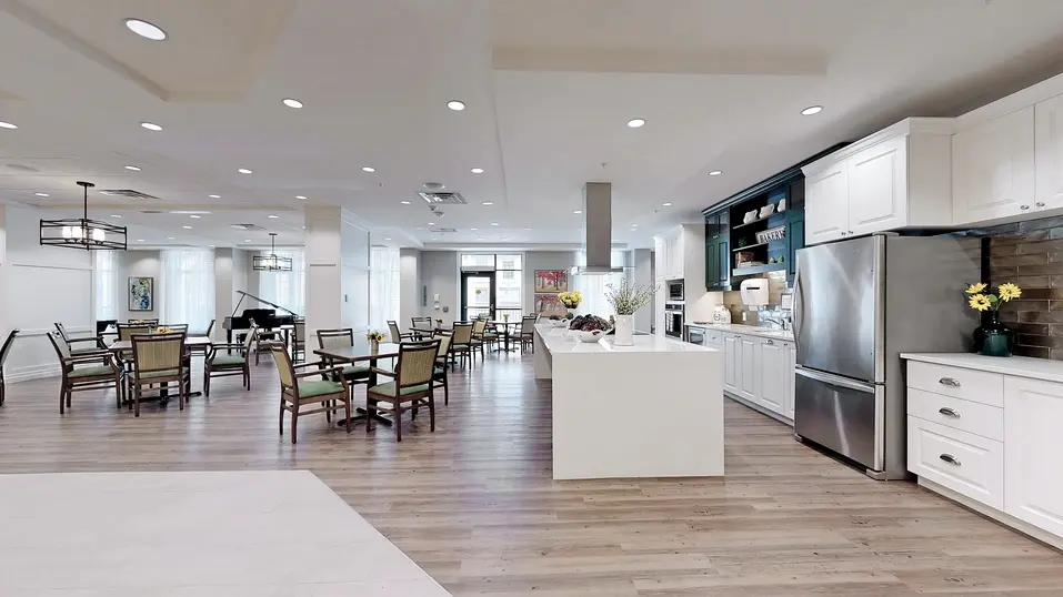 Alternative view of country kitchen with counter top and table and chairs at Chartwell Fraser Terrace
