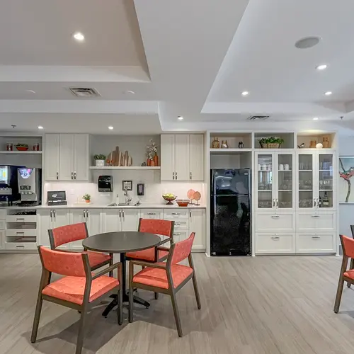 Bistro with table and chairs at Chartwell Dufferin Centre