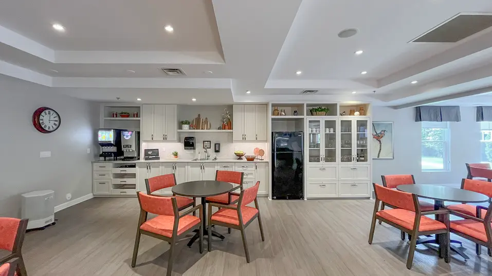 Bistro with table and chairs at Chartwell Dufferin Centre