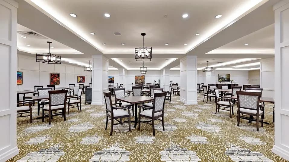 Dining room with table and chairs at Chartwell Fraser Terrace