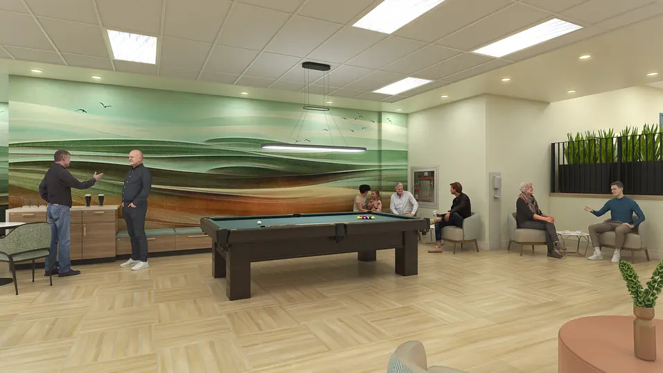 Activity room renovation rendering with billiards table and lounge seating at Chartwell Grenadier / Rendu de rénovation de la salle d’activités avec table de billard et coin détente à Chartwell Grenadier