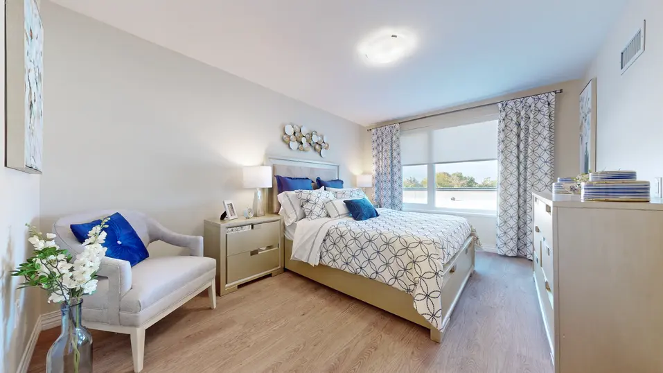 Model suite of bedroom at Chartwell St. Catharines