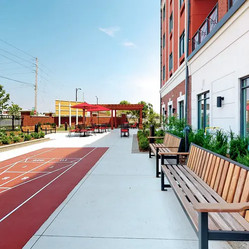 Patio with shuffle board at Chartwell St. Thomas