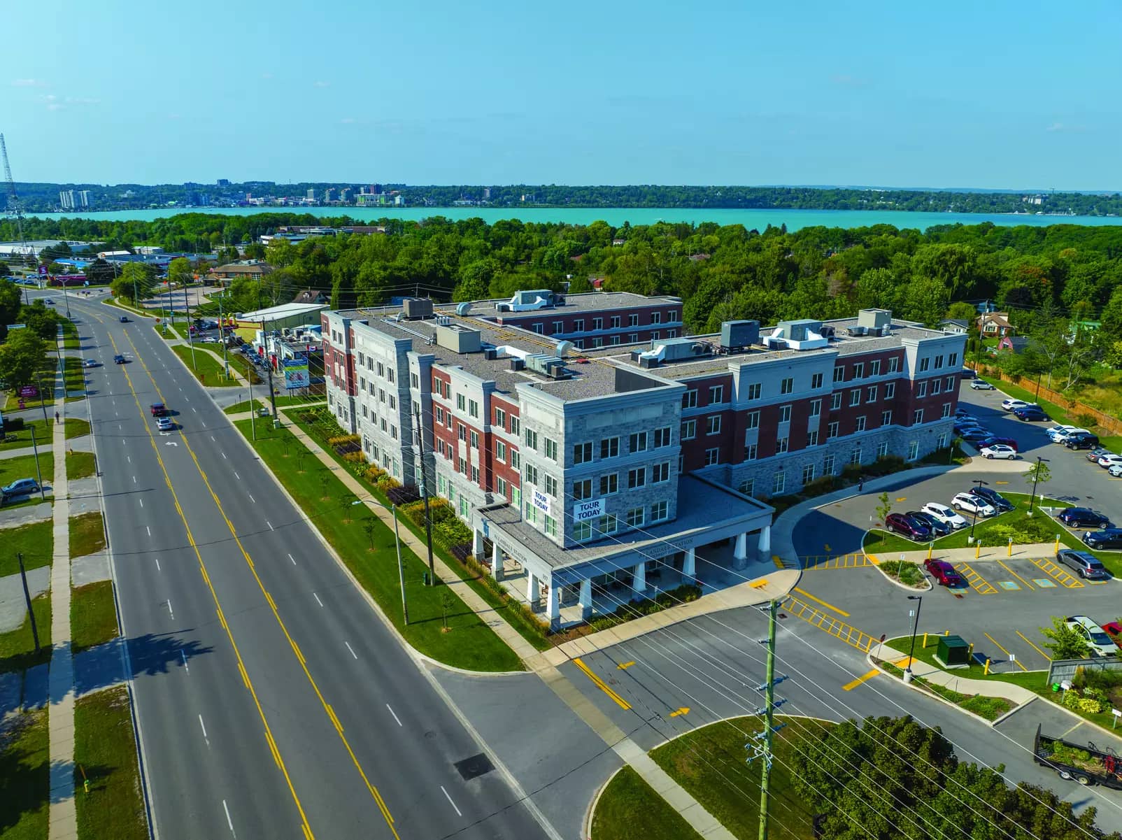 Chartwell Allandale Station Retirement Residence aerial shot of entire residence and the lake.