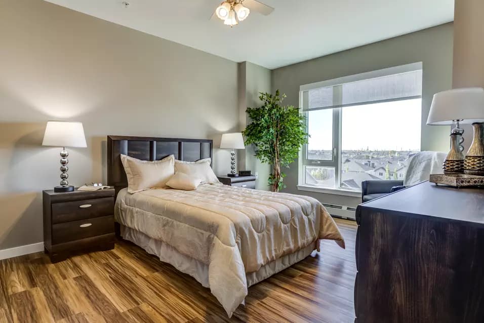 sunny and bright bedroom at chartwell emerald hills retirement residence