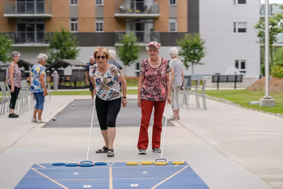 Senior ladies playing shuffle board