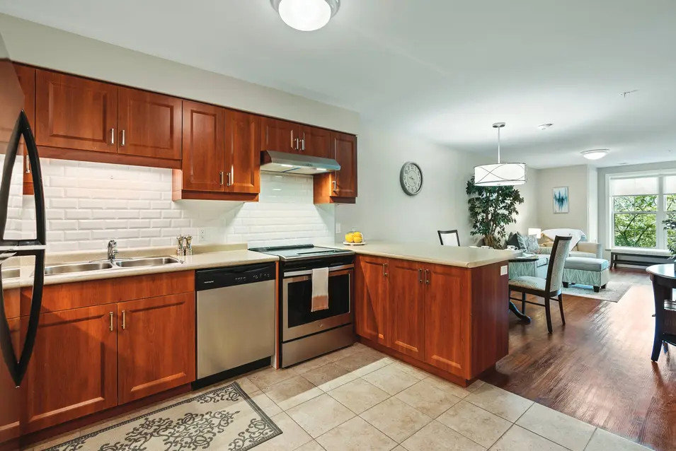 Suite kitchen and dining area with view at Chartwell Bankside Retirement Residence Senior Apartments