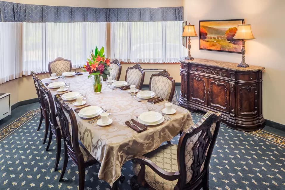 Bright and open private dining room at Chartwell Park Place Retirement Residence.