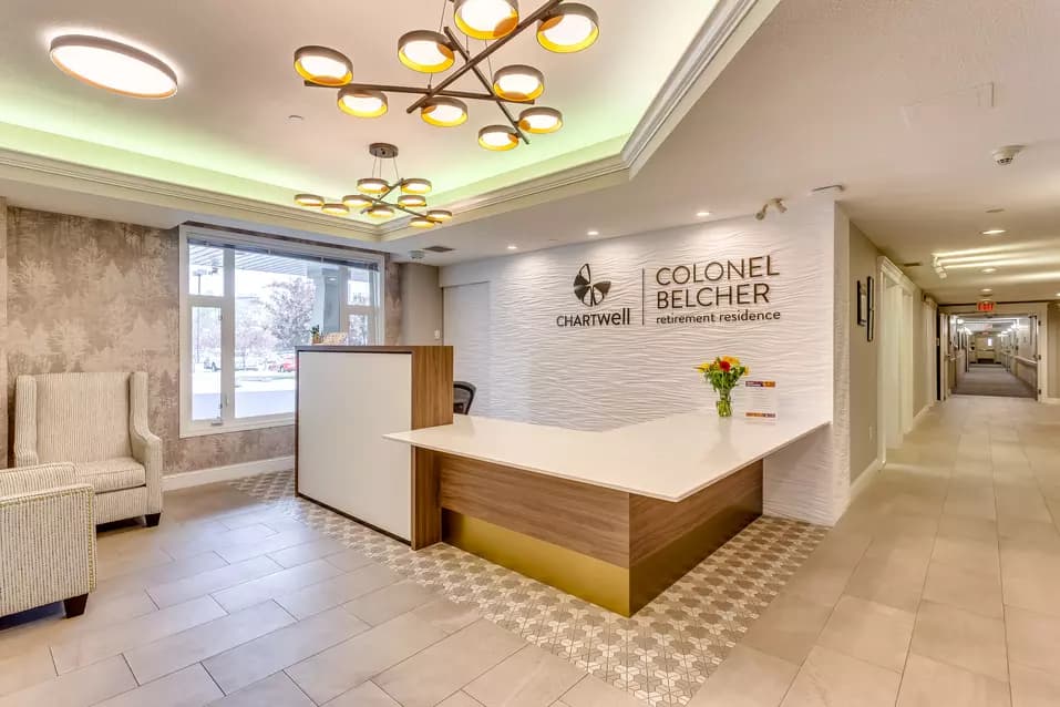 inviting and warm reception desk at chartwell colonel belcher retirement residence