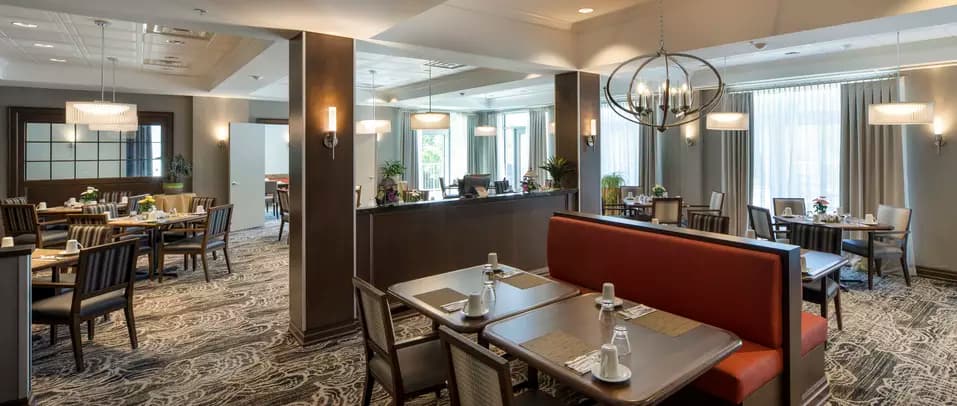 Chartwell Montgomery Village Retirement Residence spacious dining room with lovely natural light