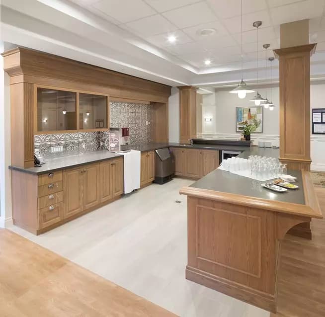 Basement lounge and bar at Chartwell Waterford Retirement Residence