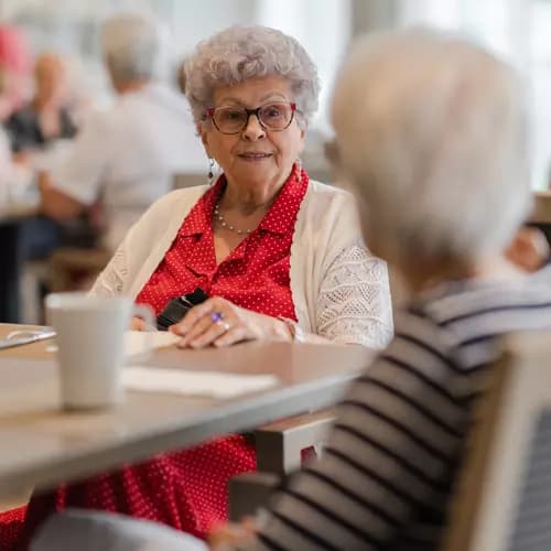 Chartwell Residence Ladies enjoying cup of Coffee in dinning room