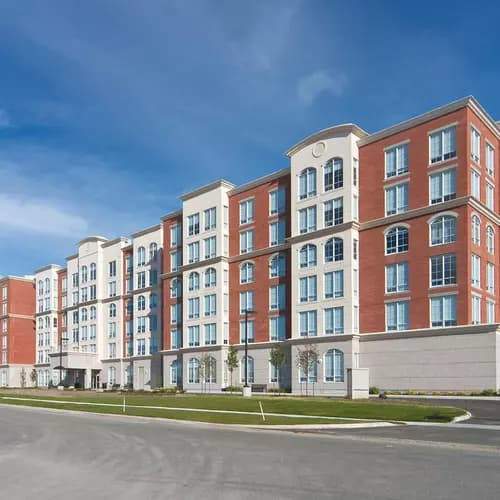 Full building exterior at Chartwell Valley Vista Retirement Residence