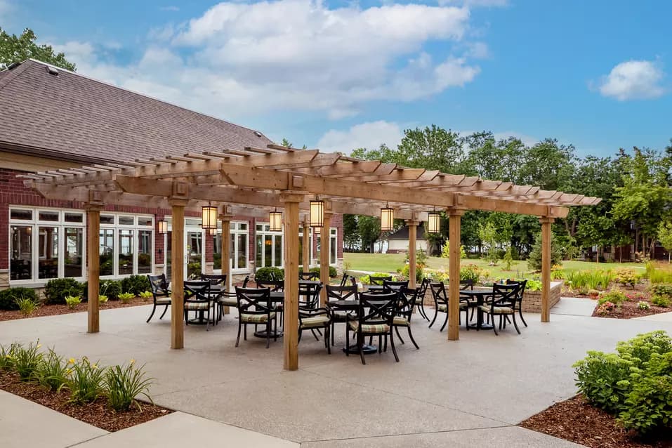 Chartwell St Clair Beach's exterior pergola, tables and chairs