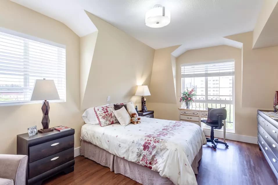 bright and sunny bedroom at chartwell fountains of mission retirement residence