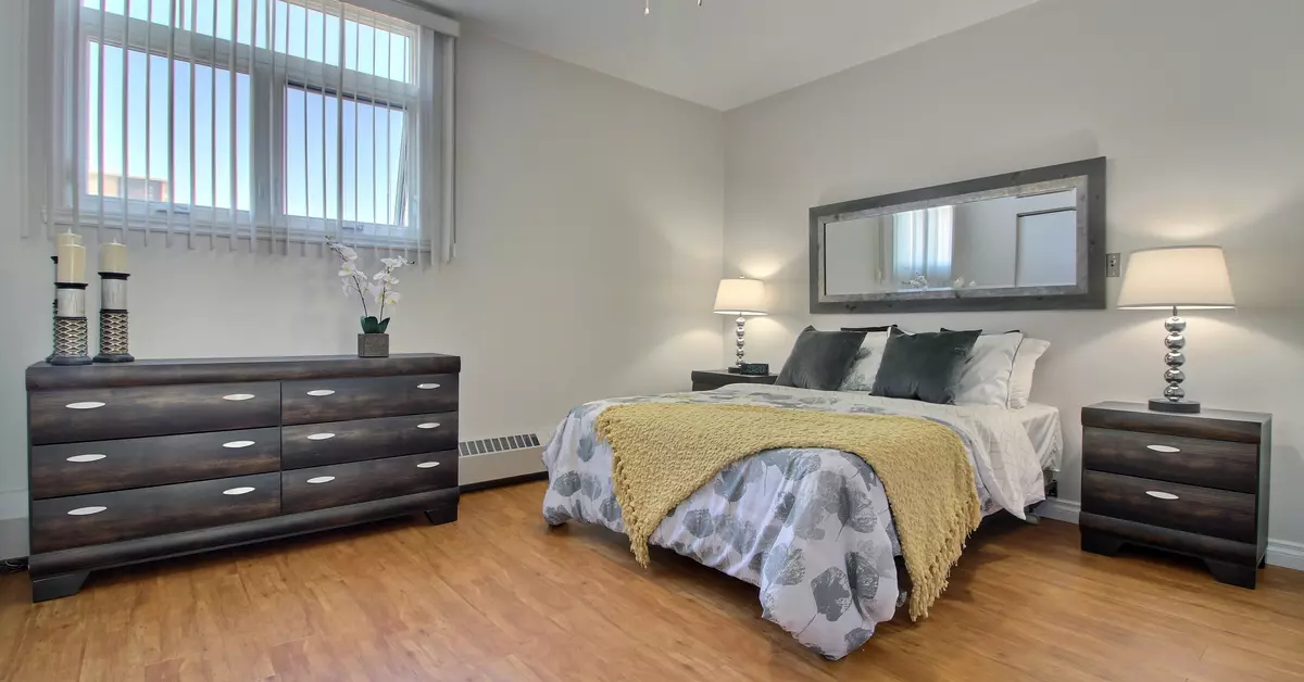 Chambre à coucher dans appartement modèle Chartwell Jardins de la Gare résidence pour retraités